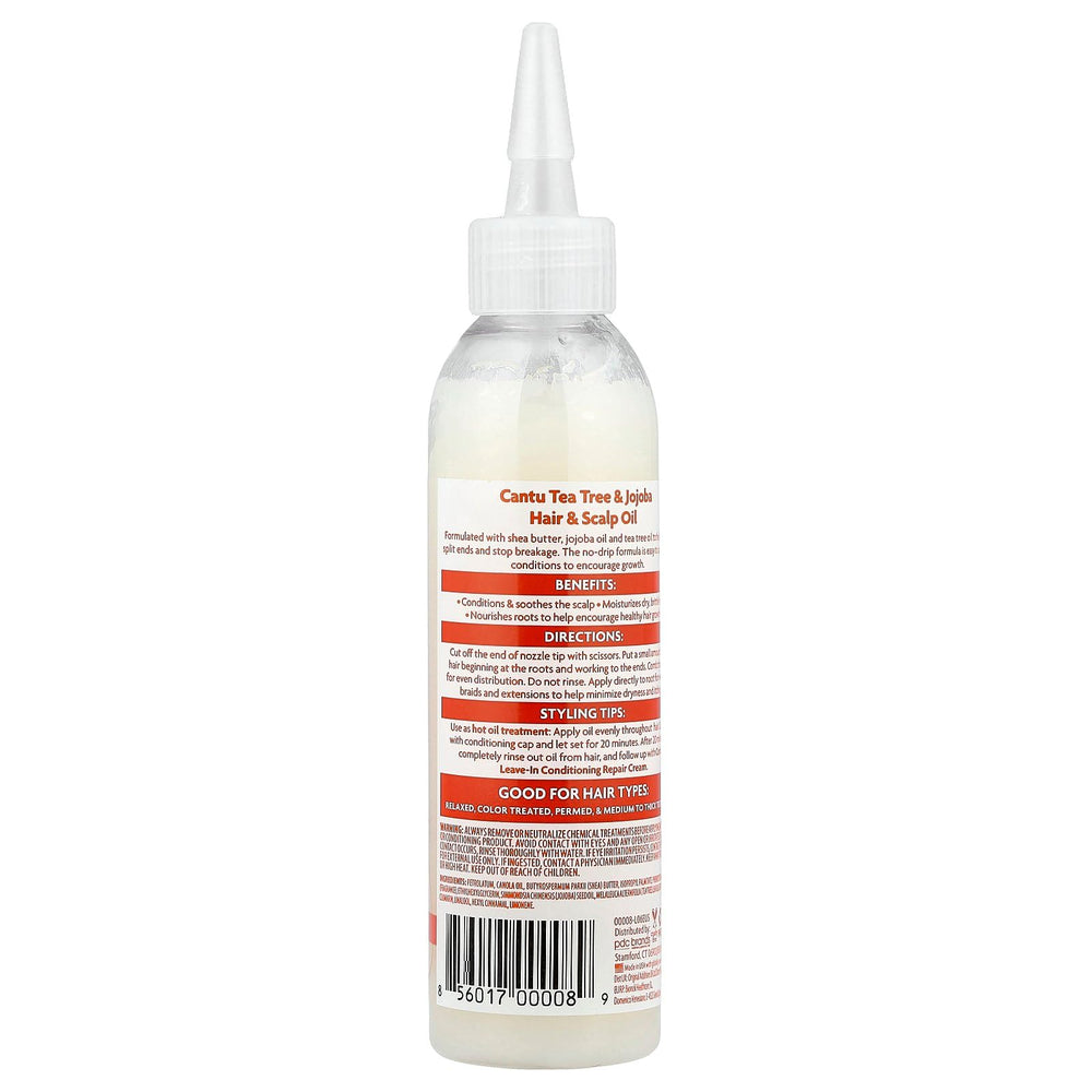 Cantu Shea Butter No Drip Oil on hair with natural shine.