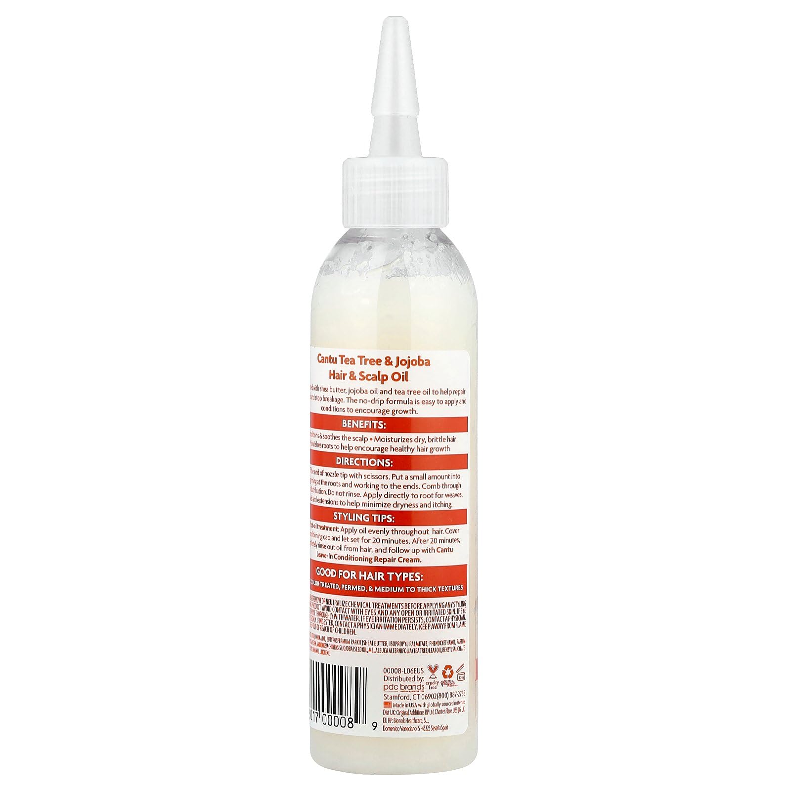 Cantu No Drip Oil applied to scalp for nourished feel.