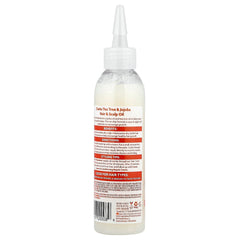 Cantu No Drip Oil applied to scalp for nourished feel.
