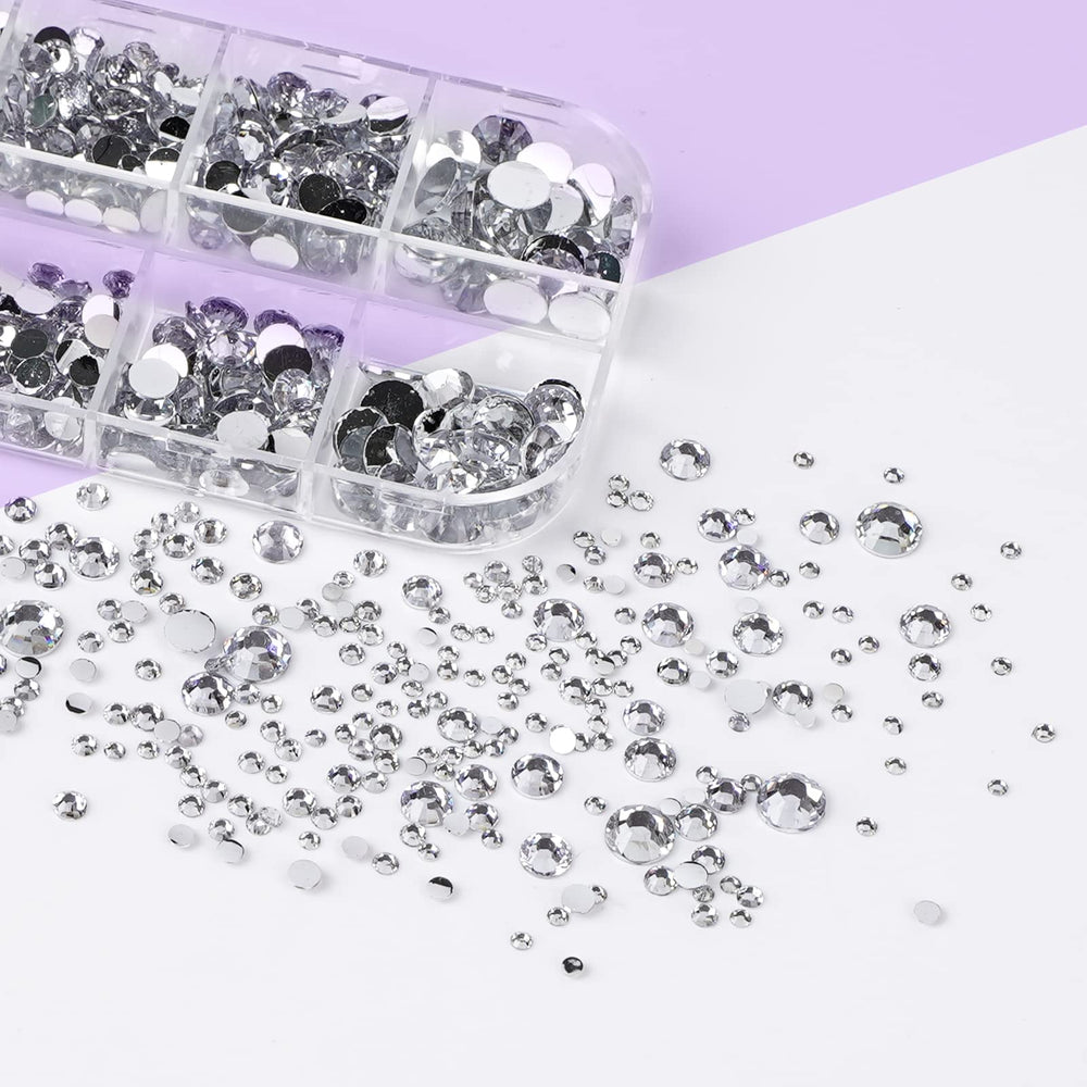 Canvalite tweezers and wax pen for easy rhinestone handling.