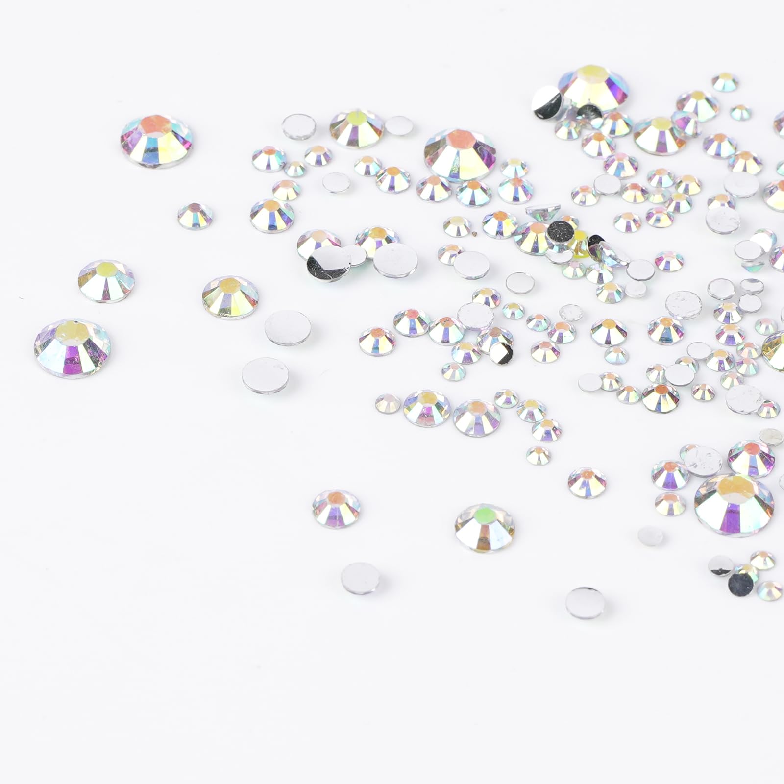 Canvalite precision tweezers designed to lift tiny gems securely.