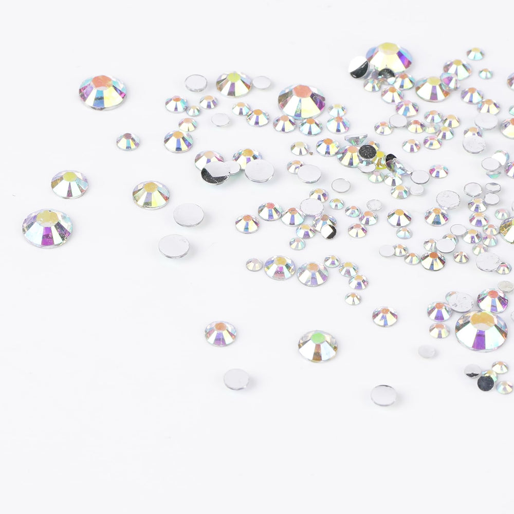 Canvalite precision tweezers designed to lift tiny gems securely.
