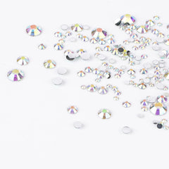 Canvalite precision tweezers designed to lift tiny gems securely.