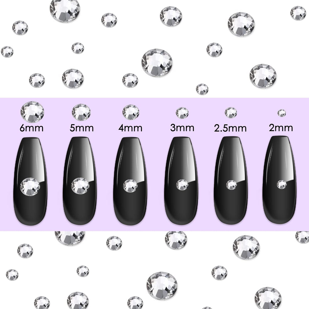 Canvalite rhinestone picker and dotting pen for precise gem placement.