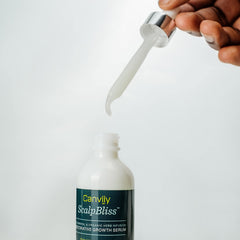 Canviiy ScalpBliss dropper applying serum to scalp for targeted hydration.