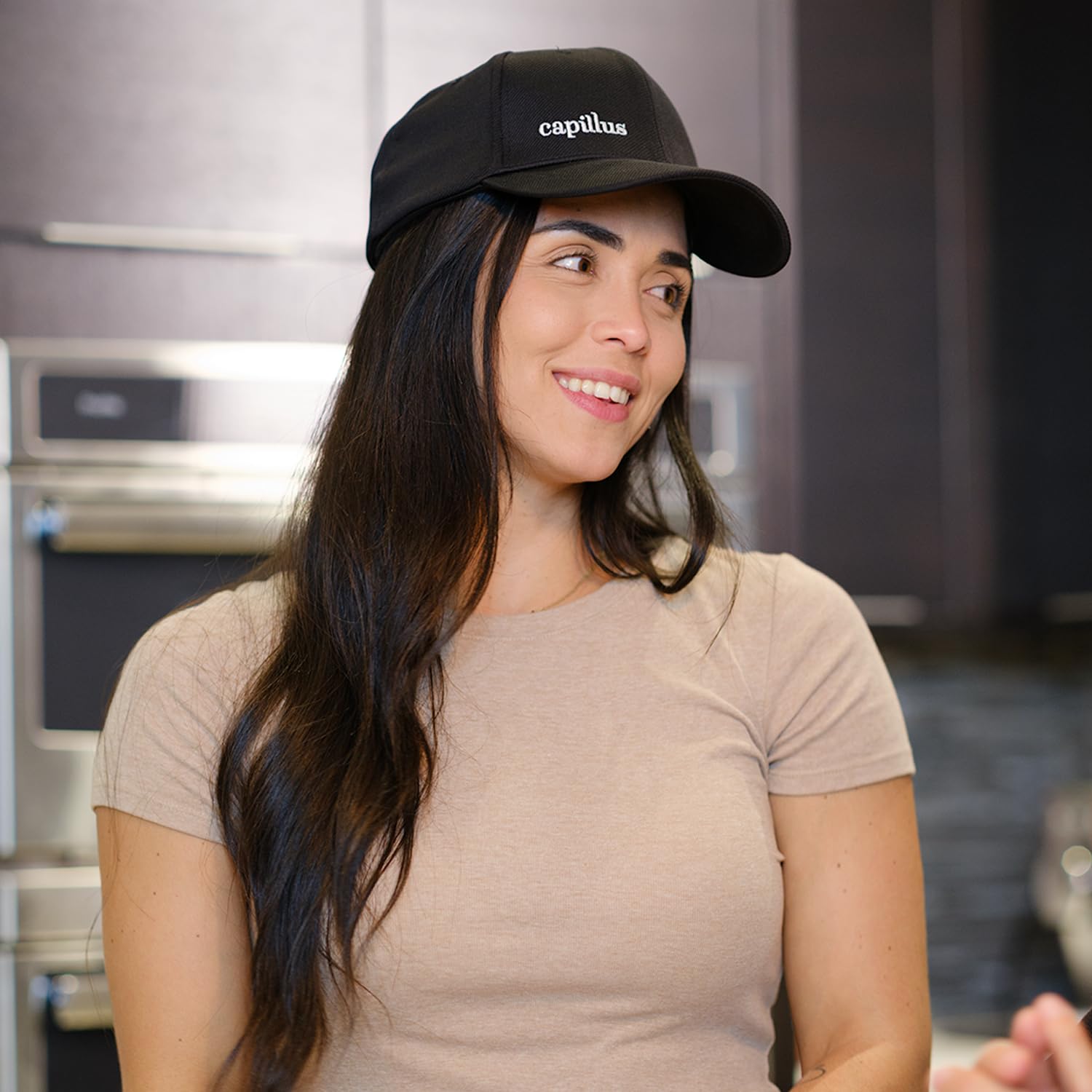 Capillus Pro charging dock with portable battery for easy sessions.