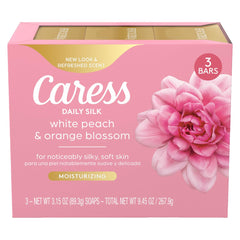 Caress Beauty Bar soap close-up shows creamy lather for silky skin.