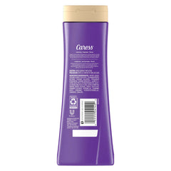 Caress Black Orchid & Patchouli body wash lather in rich, foamy texture.