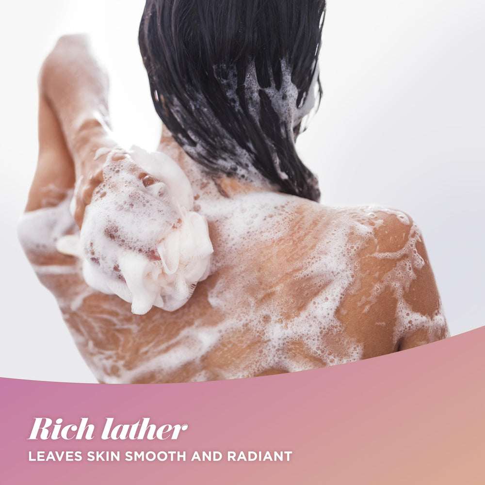 Caress Body Wash dense lather close up on skin.