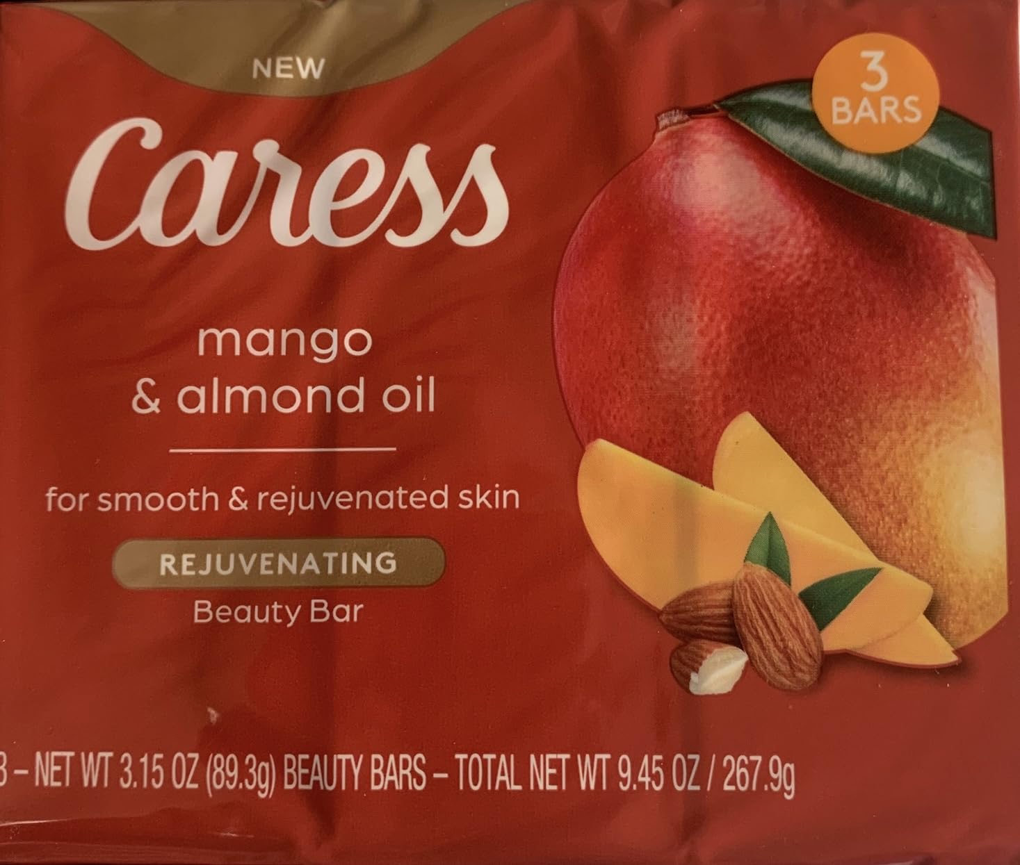 Caress Mango & Almond Oil bar soap with tropical scent and moisturizing lather.