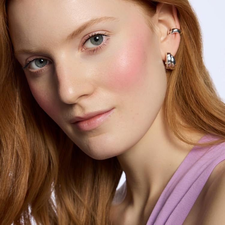 Catrice Blush Affair powder blush application with fluffy brush for depth