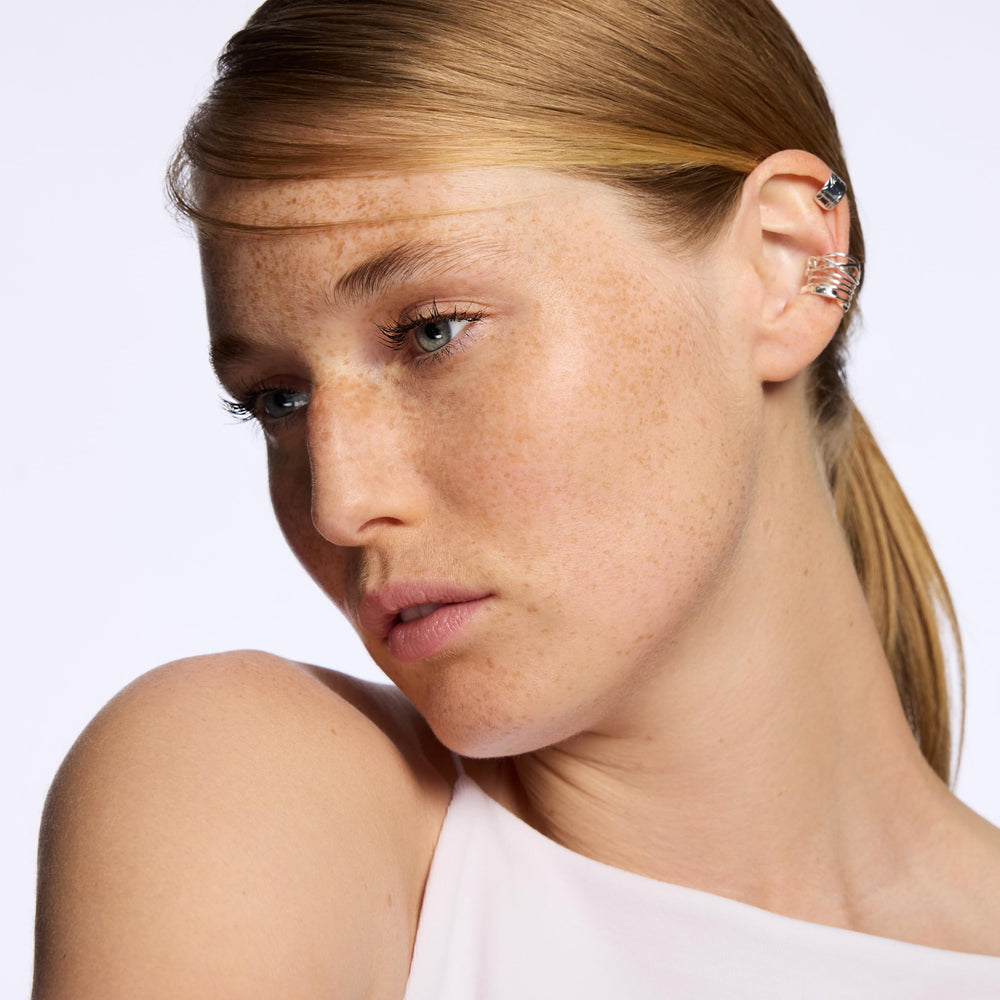 Pink-tinted shade adds gentle brightness to the complexion