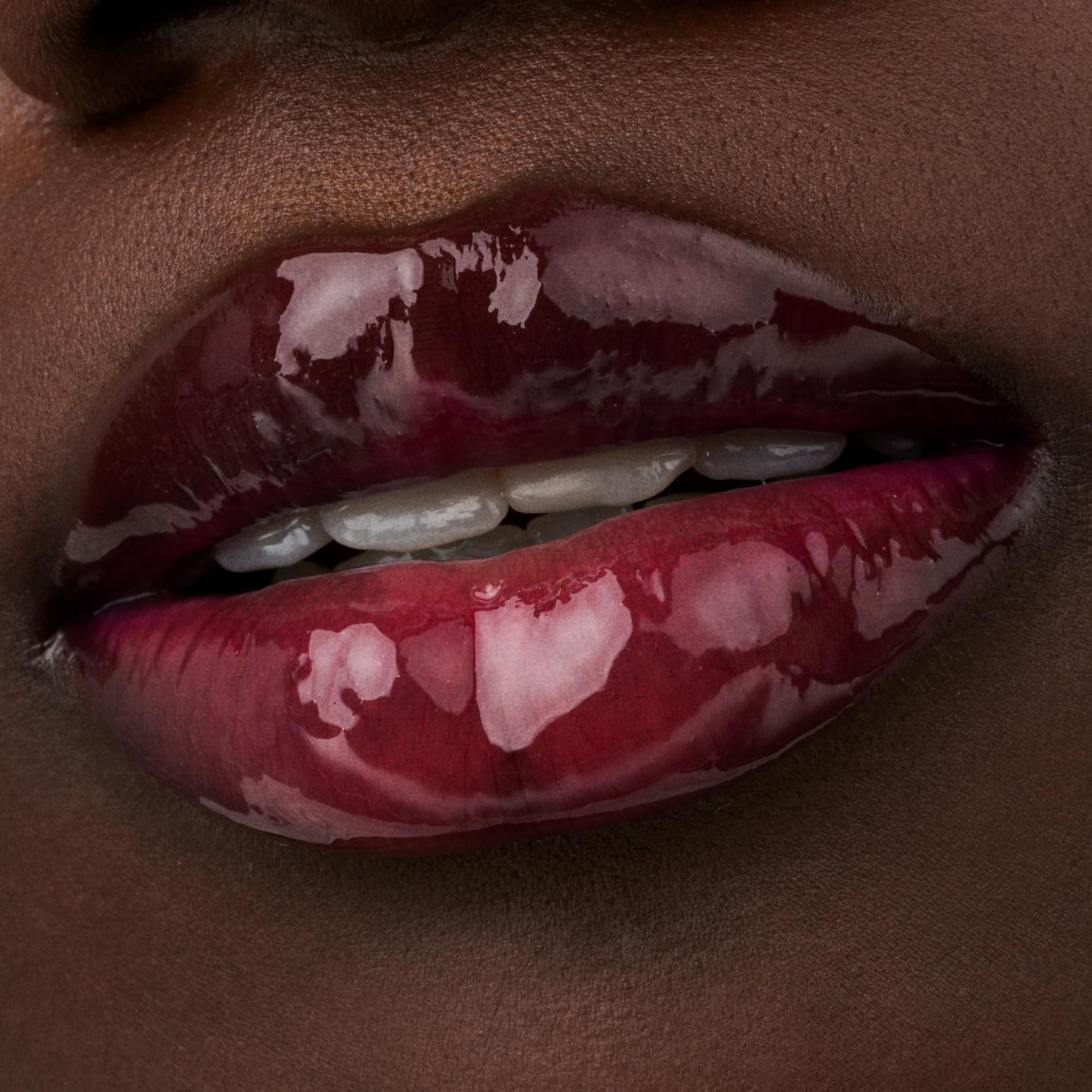 Vegan cruelty-free bottle of Glossin’ Glow lip oil