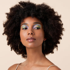 Catrice Melted Sun Cream Bronzer application on cheek demonstrates effortless blend and natural glow.