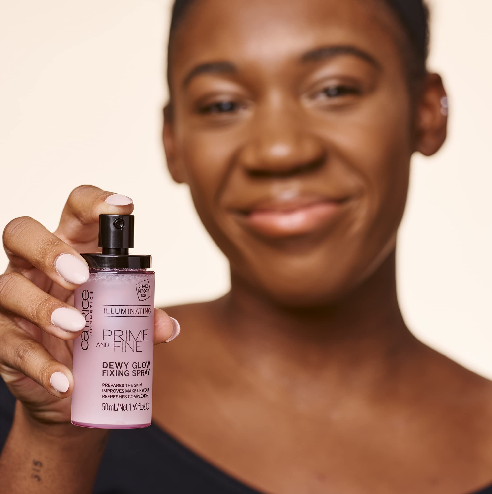 Catrice Prime & Fine Dewy Glow Spray travel-friendly size for on-the-go touch-ups.