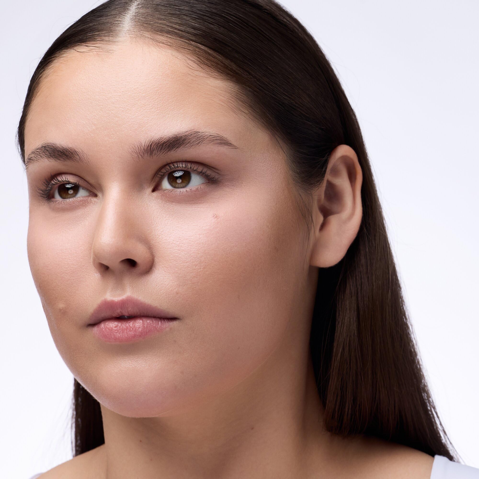 Catrice Under Eye Brightener powder under-eye finish delivers natural glow with soft blur.