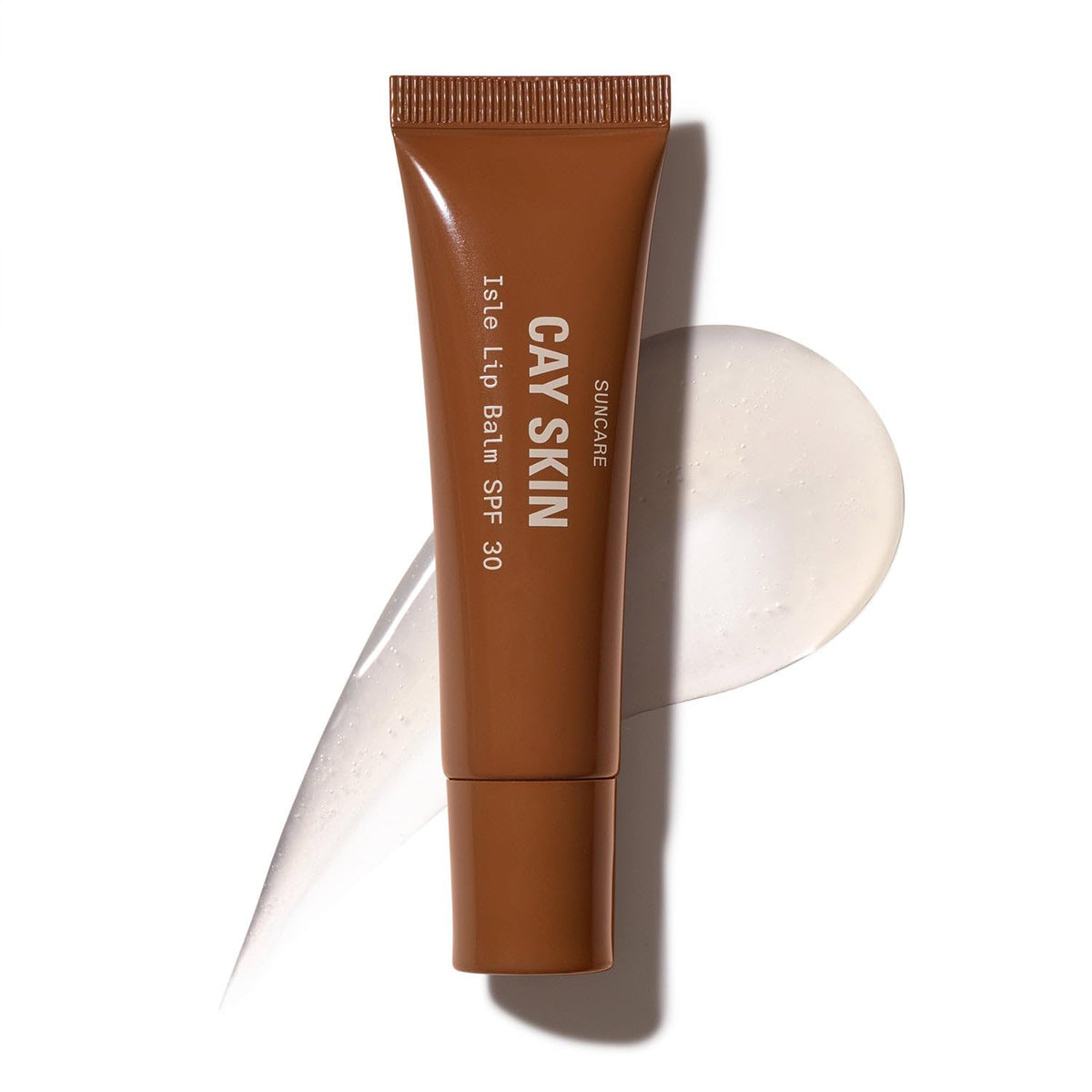 Cay Skin Isle Lip Balm SPF 30 bottle packaging highlights SPF protection and shine.