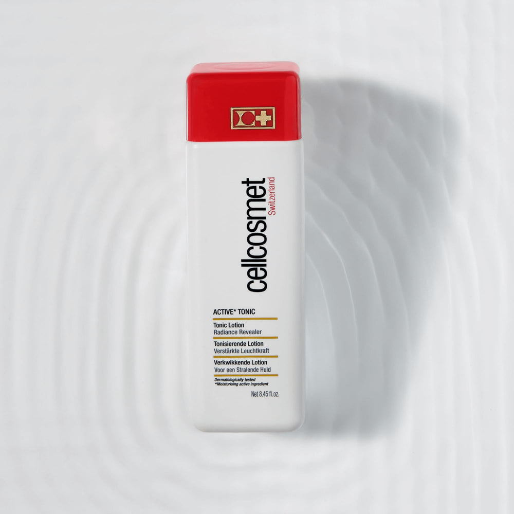 Cellcosmet Active Toner texture on skin during application indicating gentle exfoliation