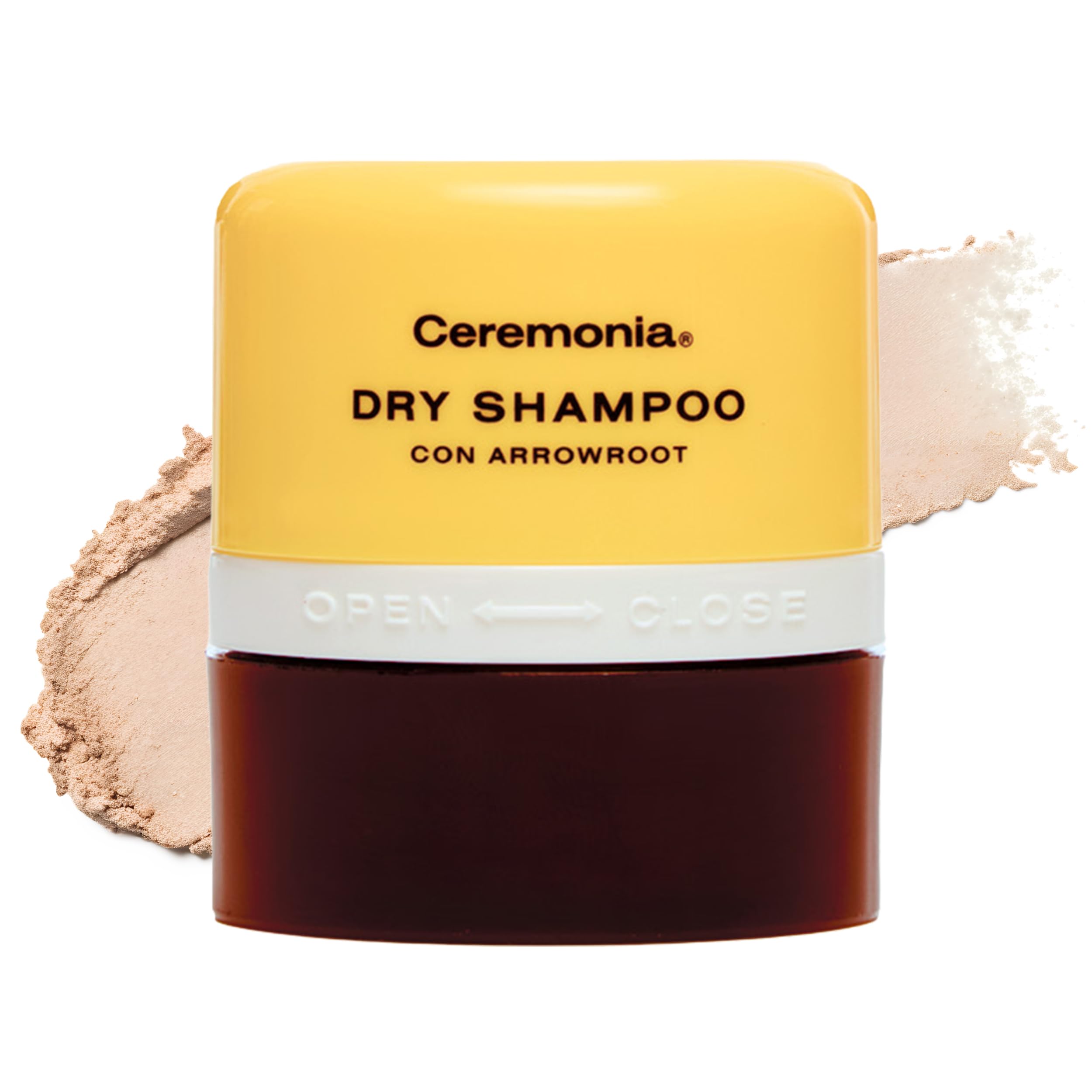 Ceremonia dry shampoo arrowroot pouf in use on roots for targeted oil absorption.
