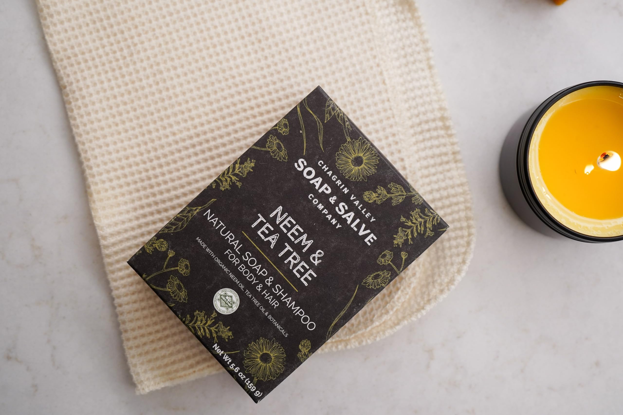 Chagrin Valley Neem & Tea Tree bar travel-friendly packaging displayed.