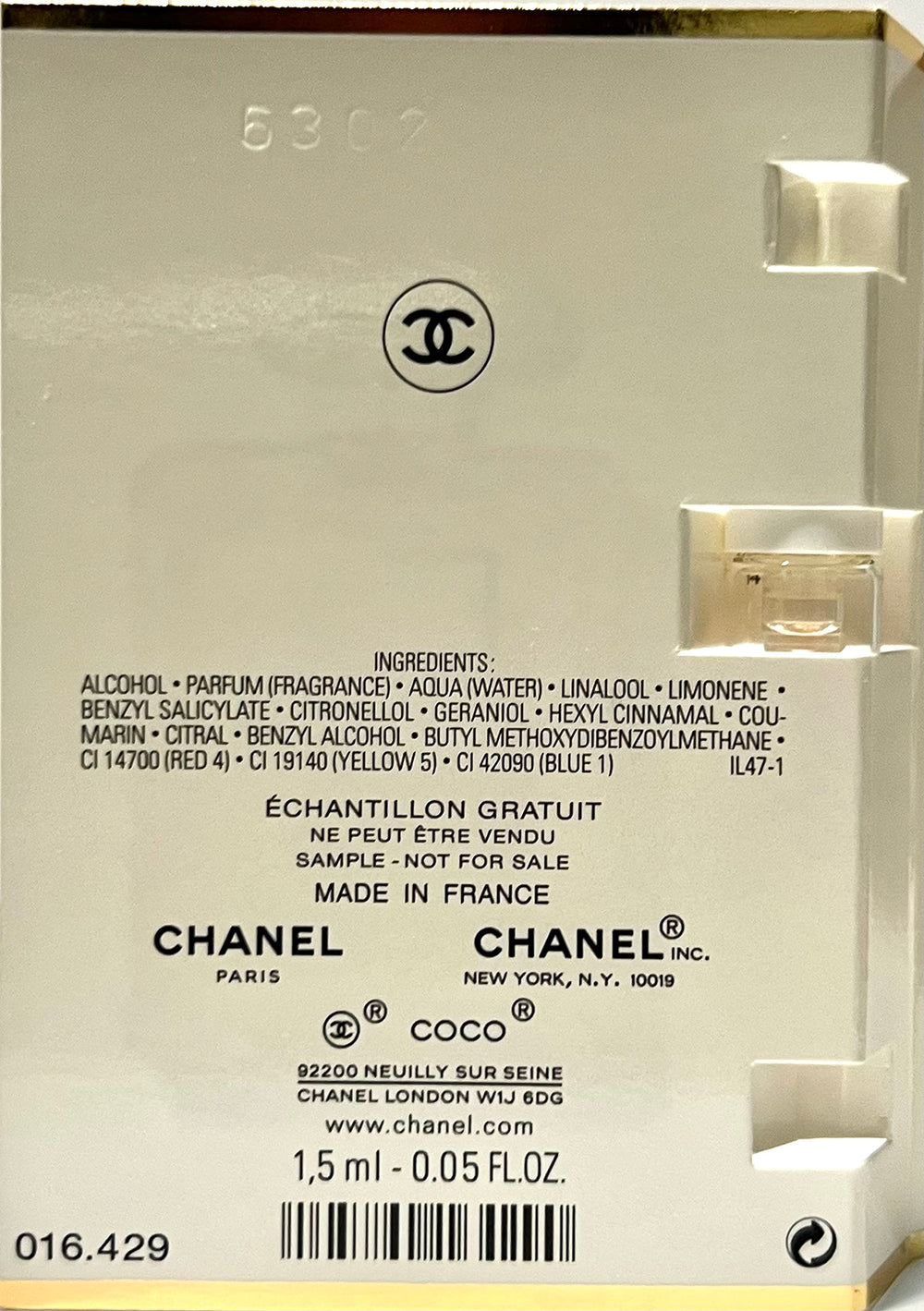 CHANEL Coco Mademoiselle ornate bottle detail evokes timeless sophistication.