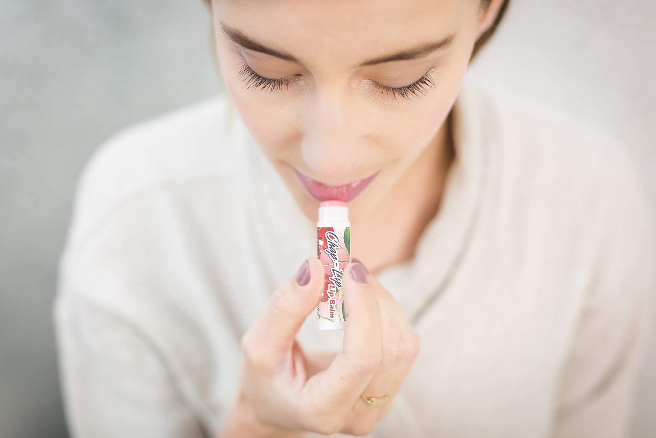 Chap-Lip Vitamin E lip balm label highlighting antioxidant care.