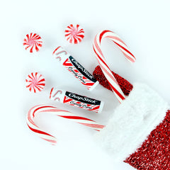 ChapStick Candy Cane Peppermint lip balm in hand for on-the-go moisture