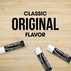 A home or office drawer holds ChapStick bulk lip care for quick moisture.