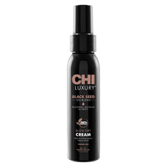 CHI Luxury Black Seed Oil Blow Dry Cream bottle highlights frizz control and shine.
