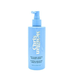 Chris McMillan Glassy Smooth Blowdry Spray bottle shows sleek, shiny finish for frizz control.