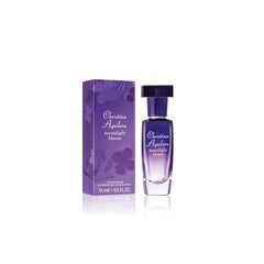 Christina Aguilera Moonlight Bloom bottle pour shows elegant evening fragrance release