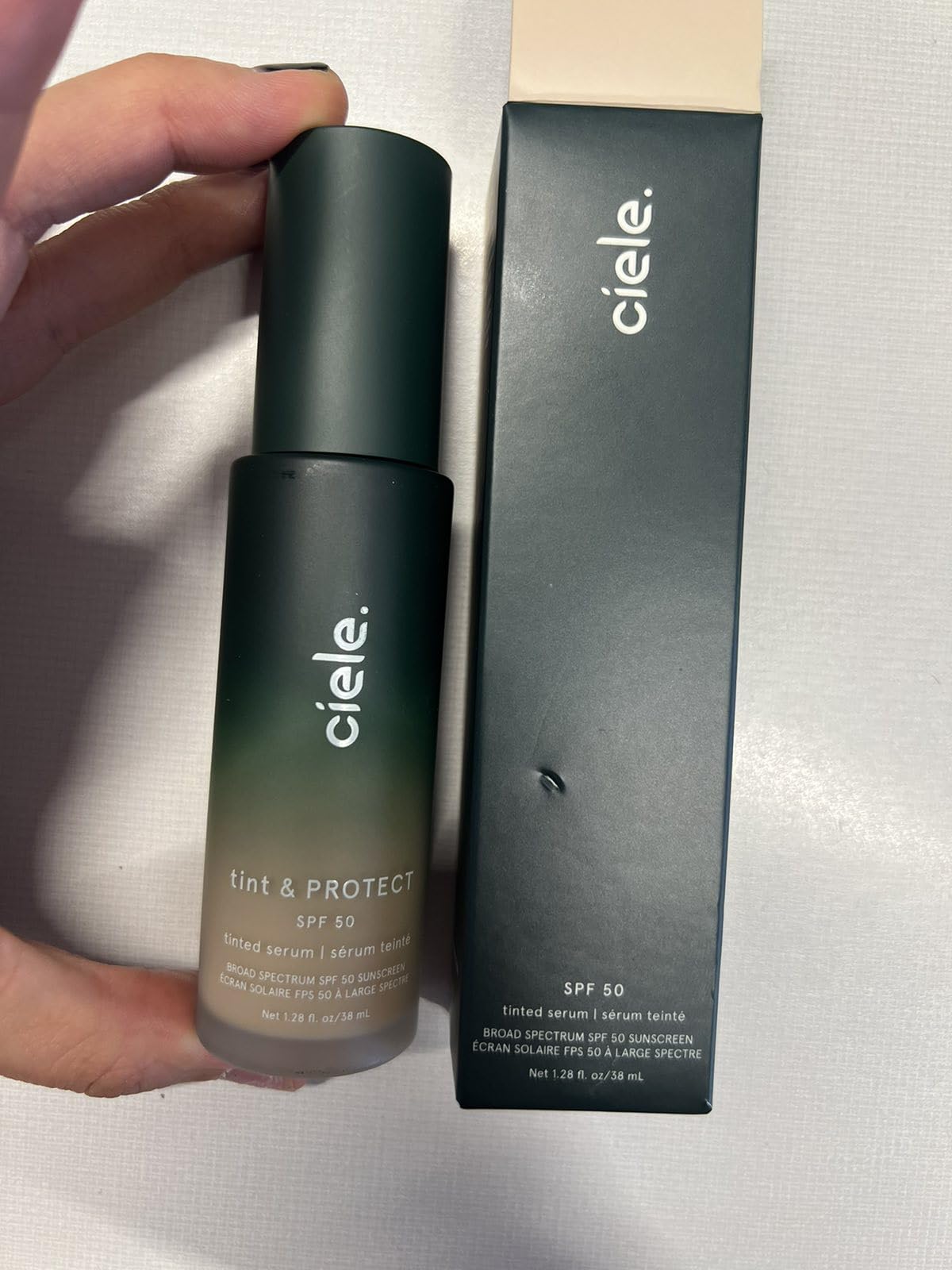 Ciele Tint & PROTECT SPF 50+ bottle pour shows weightless coverage and sun protection.