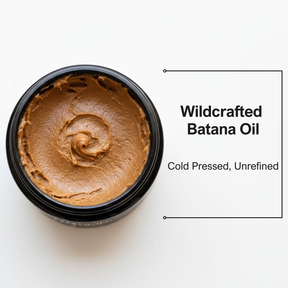 CinNoir Batana Oil bottle on counter illustrating deep conditioning benefits.