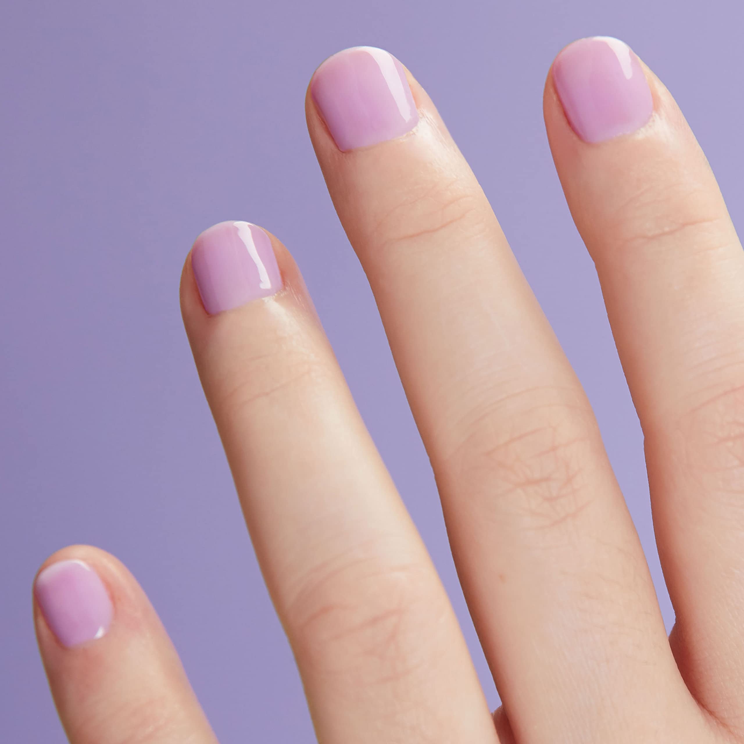 Cirque Colors Lavender Sky milky finish on nails for subtle color.