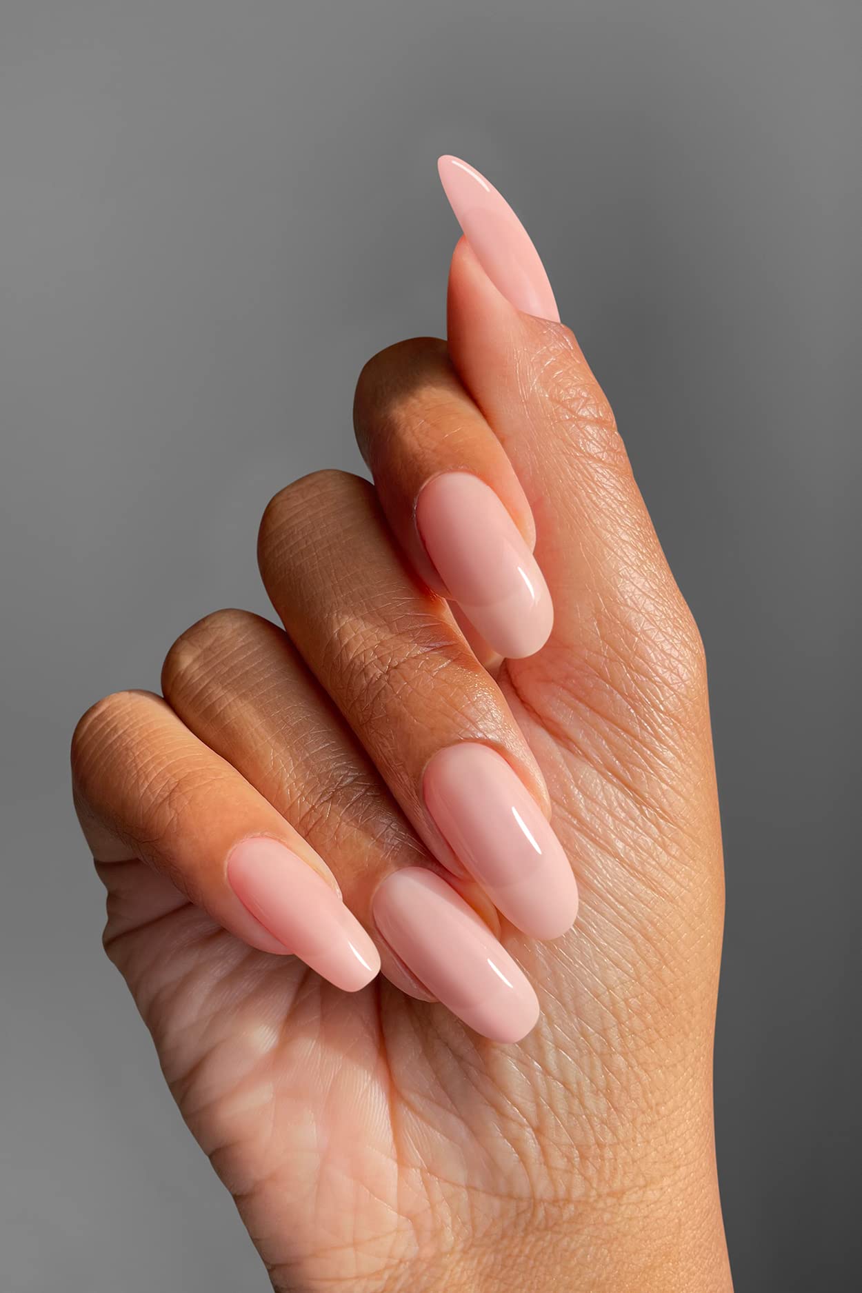 Cirque Colors Liquid Laminate Top Coat delivers gloss and enhanced durability.