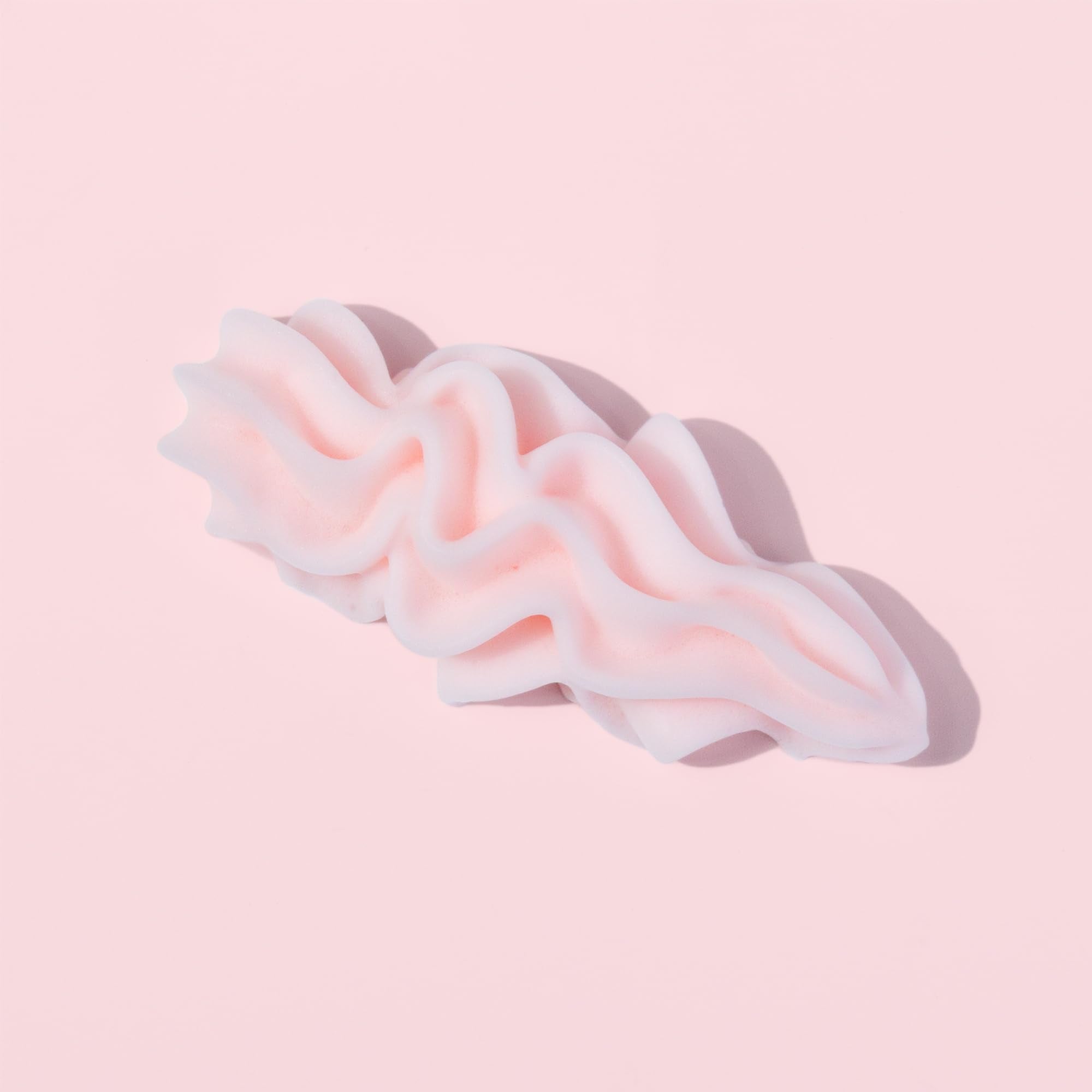 Strawberry-pink CL CAMILLASH packaging emphasizing premium design.