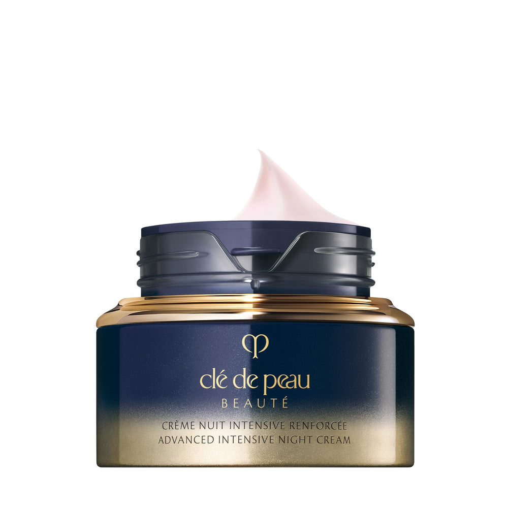 Clé de Peau Beauté Advanced Night Cream jar open, rich silky texture for hydration.