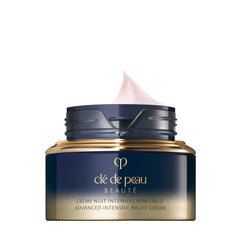 Clé de Peau Beauté Advanced Night Cream jar open, rich silky texture for hydration.