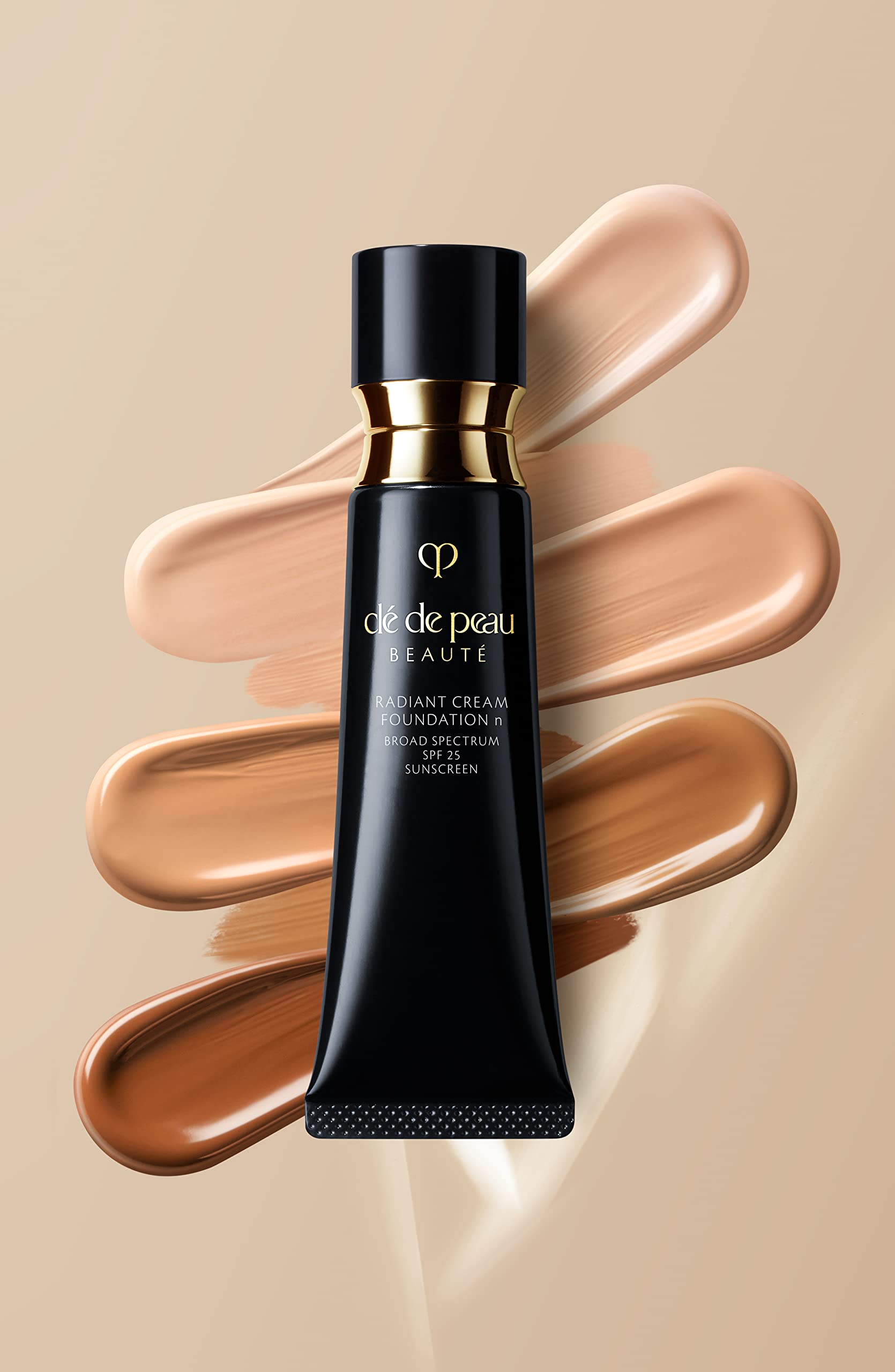 Clé de Peau Beauté Radiant Cream Foundation applied on face yields natural glow.