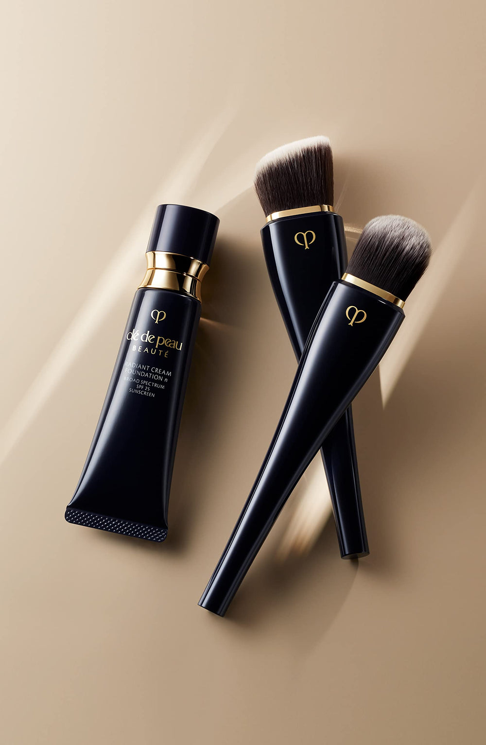 Clé de Peau Beauté Radiant Cream Foundation close-up texture reveals smooth, luminous skin.