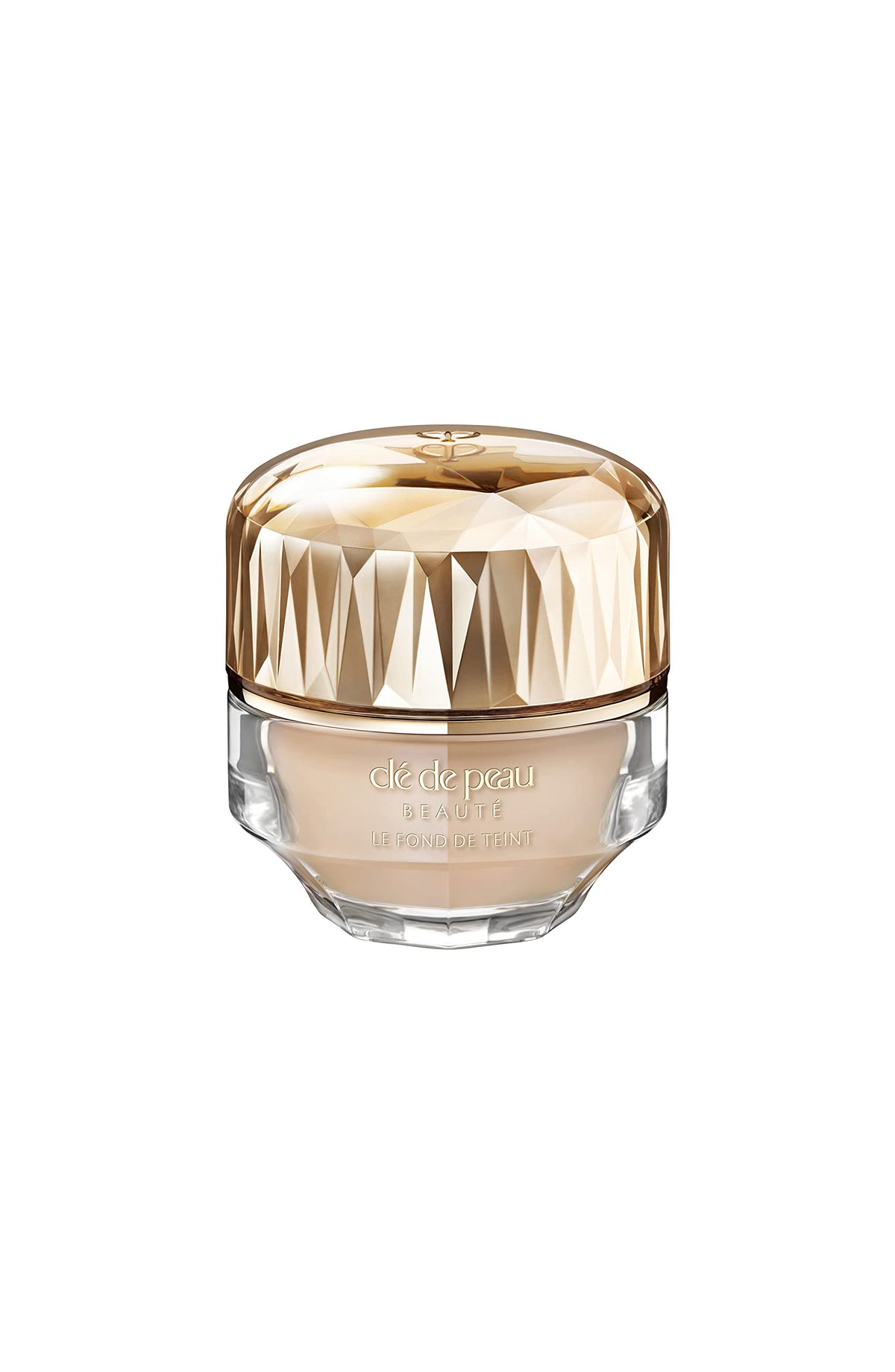 Clé de Peau Beauté foundation bottle close-up showing luxurious skincare-infused coverage