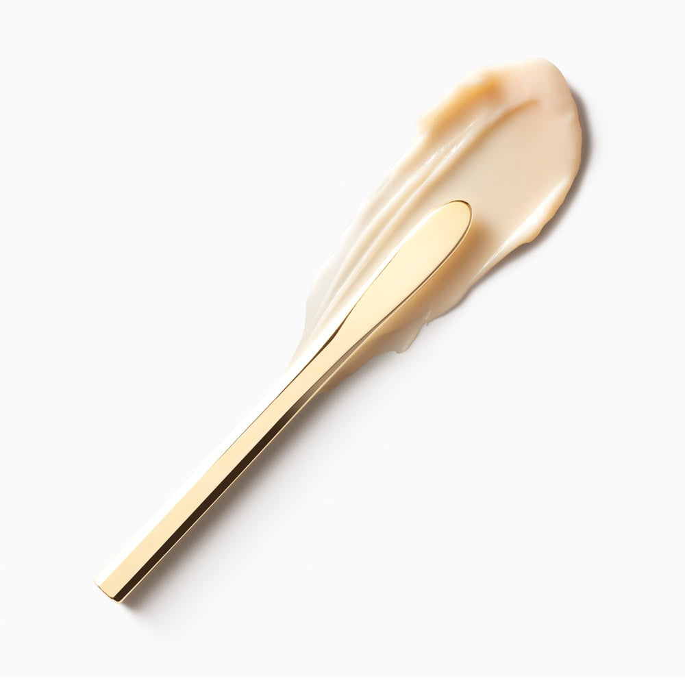 Packaging label of Clé de Peau Beauté mini volumizing cream supreme for premium branding.