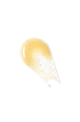 Clé de Peau Precious Gold Vitality Serum application swipe reveals luxurious, silky texture.