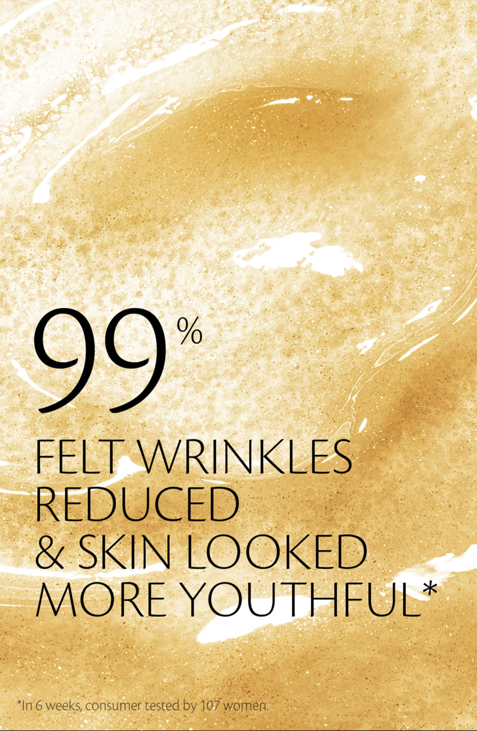 Clé de Peau Precious Gold Vitality Serum in hand suggests daily ritual.