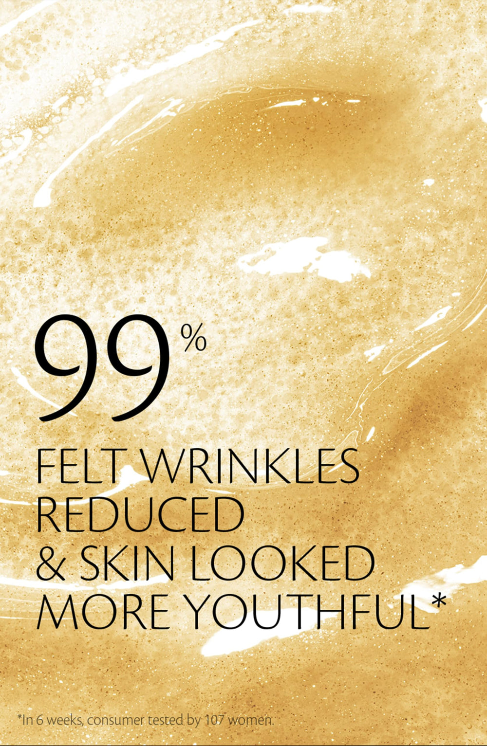 Clé de Peau Precious Gold Vitality Serum in hand suggests daily ritual.