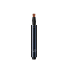 Clé de Peau Radiant Corrector Eyes Nutmeg pump for smooth, precise application.
