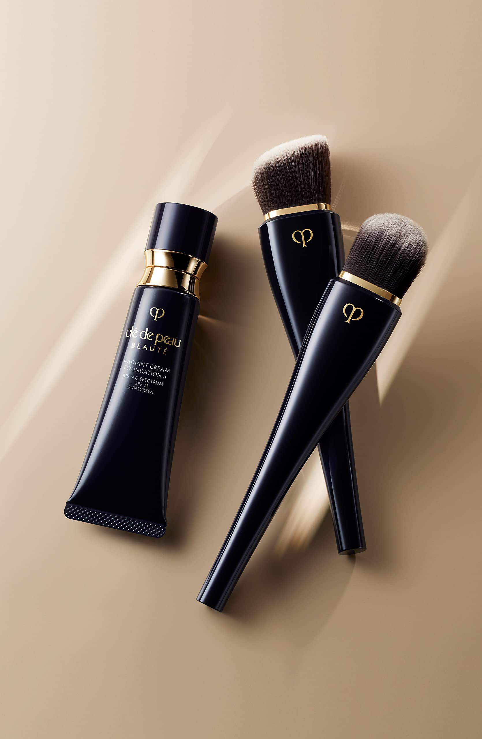 Cle de Peau Radiant Cream Foundation SPF 25 label conveys sun protection during daily use.