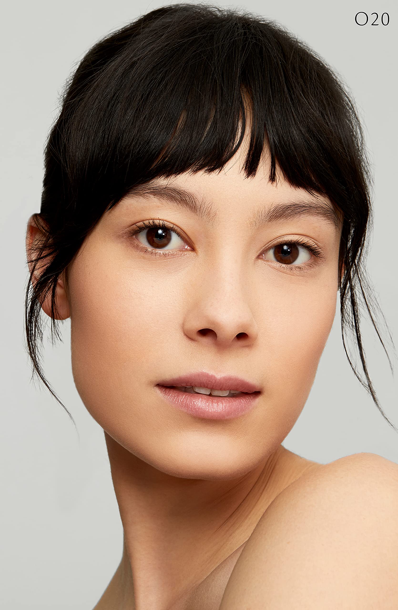Clé de Peau Radiant Fluid Foundation finished look with soft glow and even tone.
