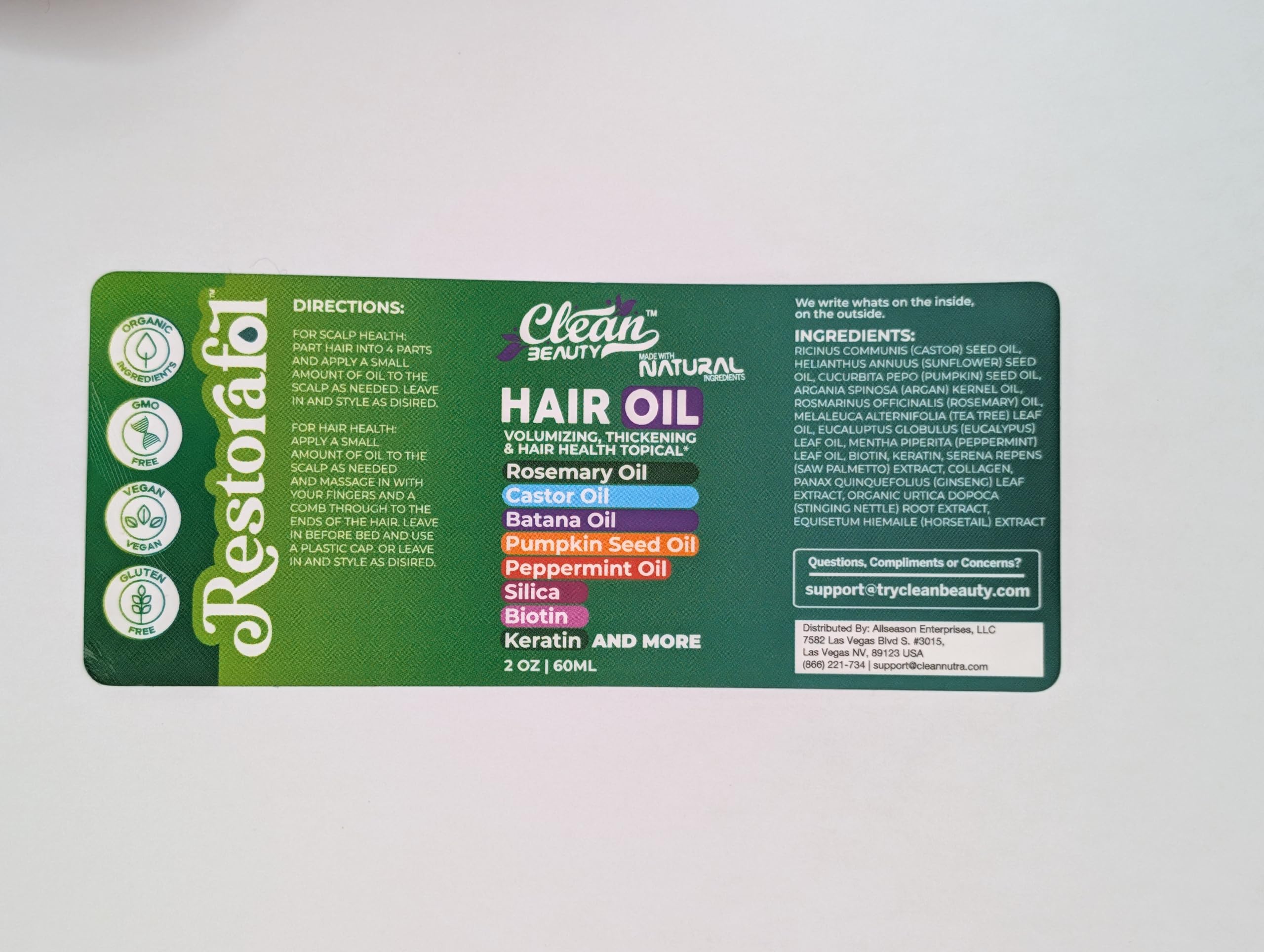 Clean Beauty hair oil ends treatment demonstrates frizz control and conditioning.