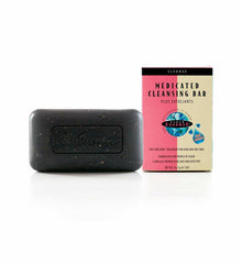 Texture close-up highlighting exfoliants for gentle cleansing.